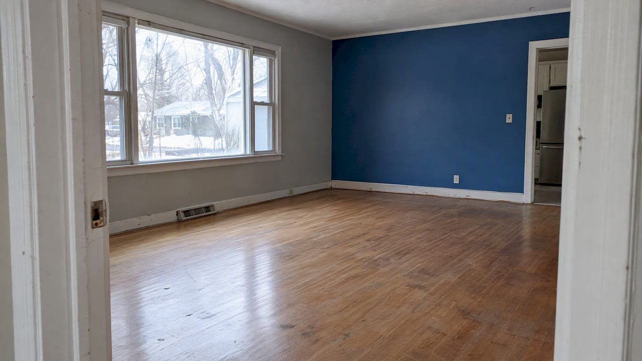 Nearly empty living room prepared for sale